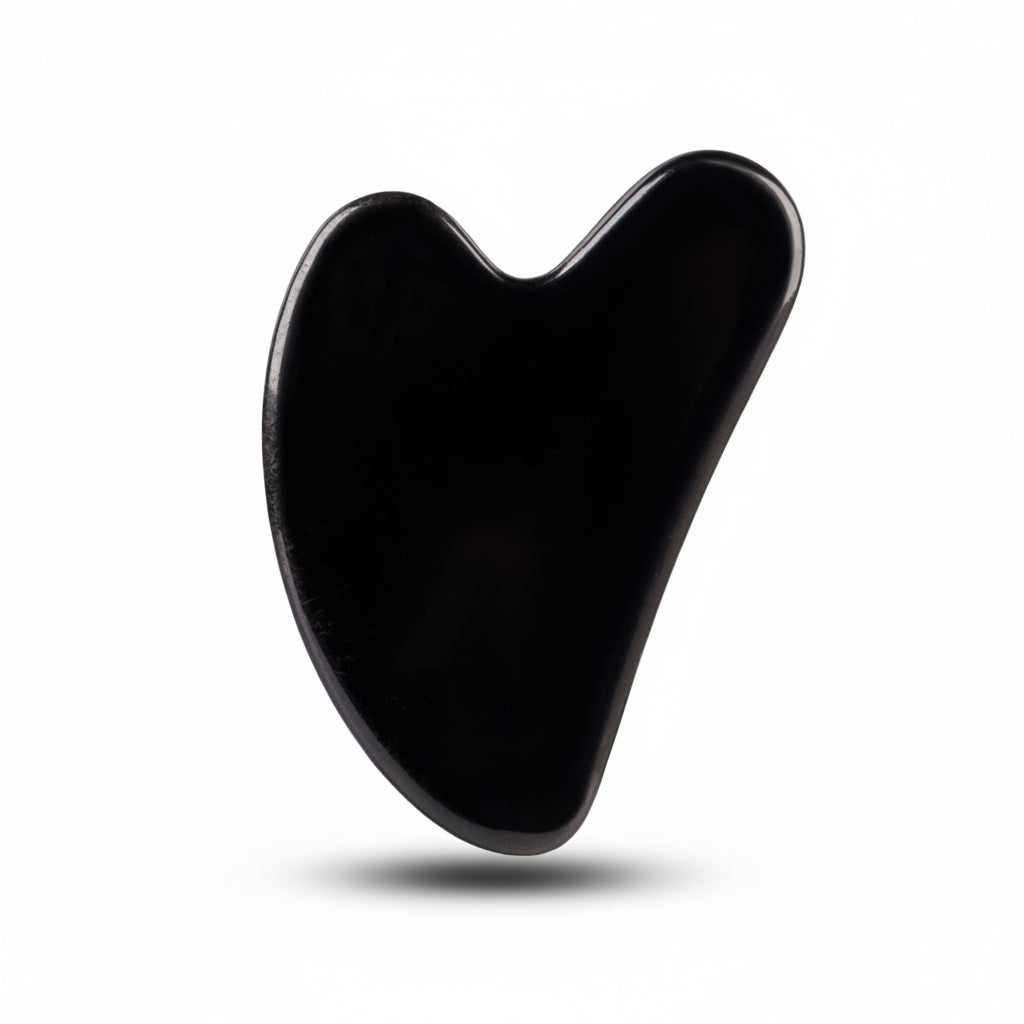Natural Black Obsidian Gua Sha tool for facial massage and jawline sculpting