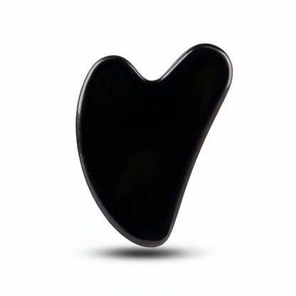Natural Black Obsidian Gua Sha tool for facial massage and jawline sculpting